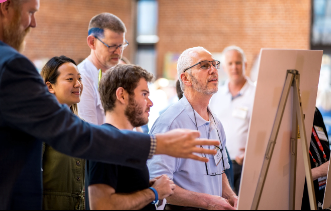 Facilitator leading a hands-on design workshop at a diabetes summit.