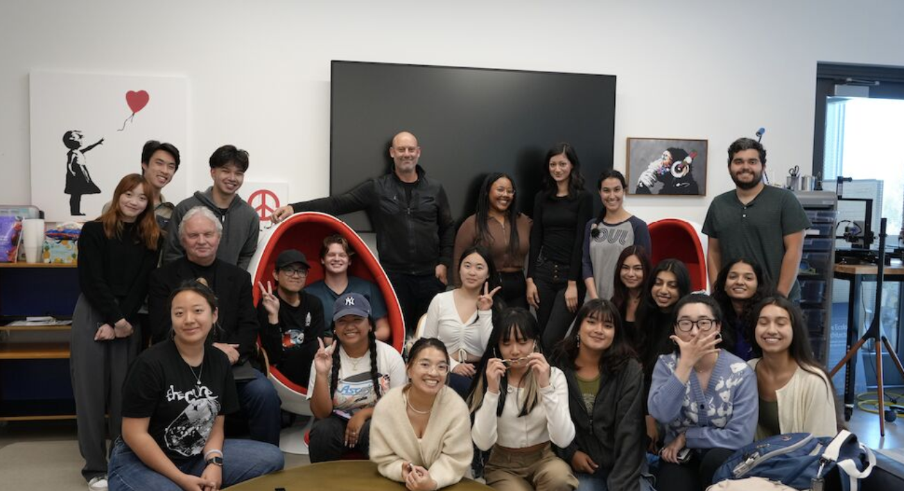 DSGN 160 Resilient Health Design class posing together in the studio.
