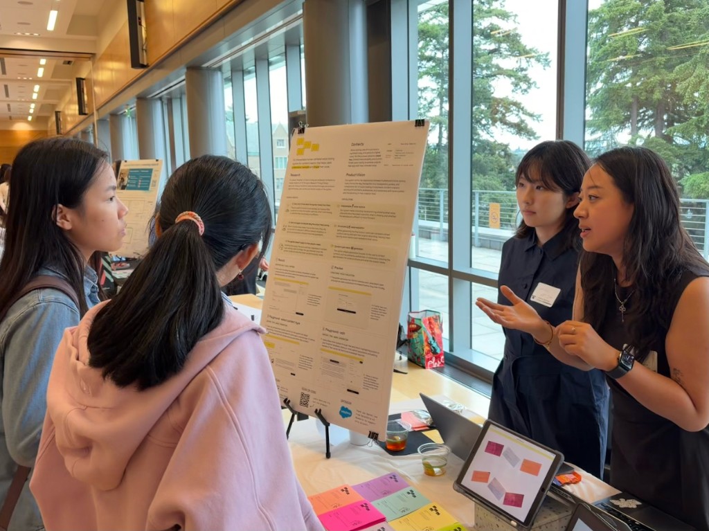 Presenting the mmmm poster and discussing the project with showcase visitors.